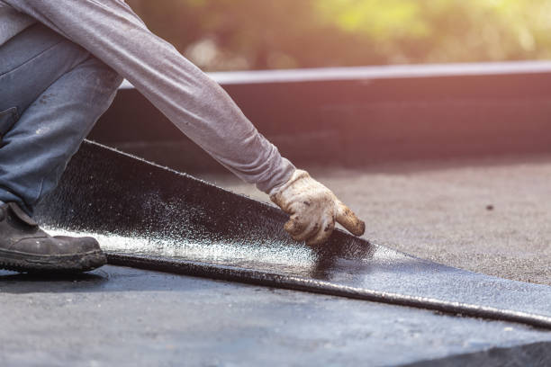 Professional Basement Waterproofing technician working in Maryland, MD